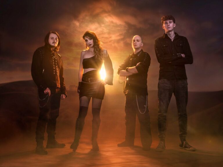 Photo of Xeneris band members standing in front of the sun